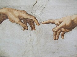 Close up from Michelangelo's The Creation of Adam from the Sistine Chapel, depicting the outstretched hand of Adam reaching towards the outstretched hand of God. This image insinuates the need for empathetic, communicative, and collaborative leaders in management positions.
